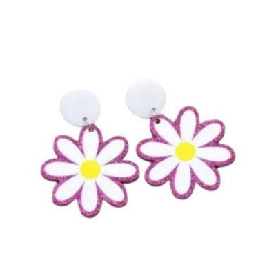 pendientes con forma e margarita y brillo fucsia